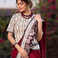 Maroon Saree Accented With Traditional Tussar Batik Print Border