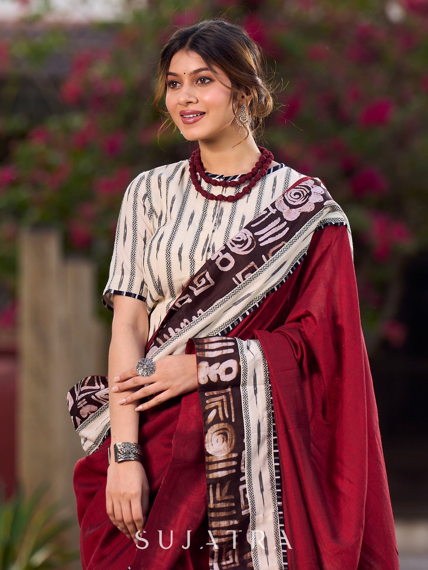 Maroon Saree Accented With Traditional Tussar Batik Print Border