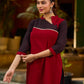 Elegant Ajrakh polka dot kurta with bold black maroon tones and an asymmetrical neck.