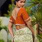 Enchanting Sage Green Saree with All-Over Foil Floral Print & Golden-Orange Trim Detail with Hand Embroidered Pallu