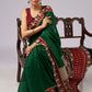 Stunning green cotton saree with beige and red floral Ajrakh accents