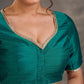 Chemisier en coton et soie vert sarcelle avec garniture en dentelle à l'encolure et au bas des manches