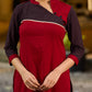 Elegant Ajrakh polka dot kurta with bold black maroon tones and an asymmetrical neck.