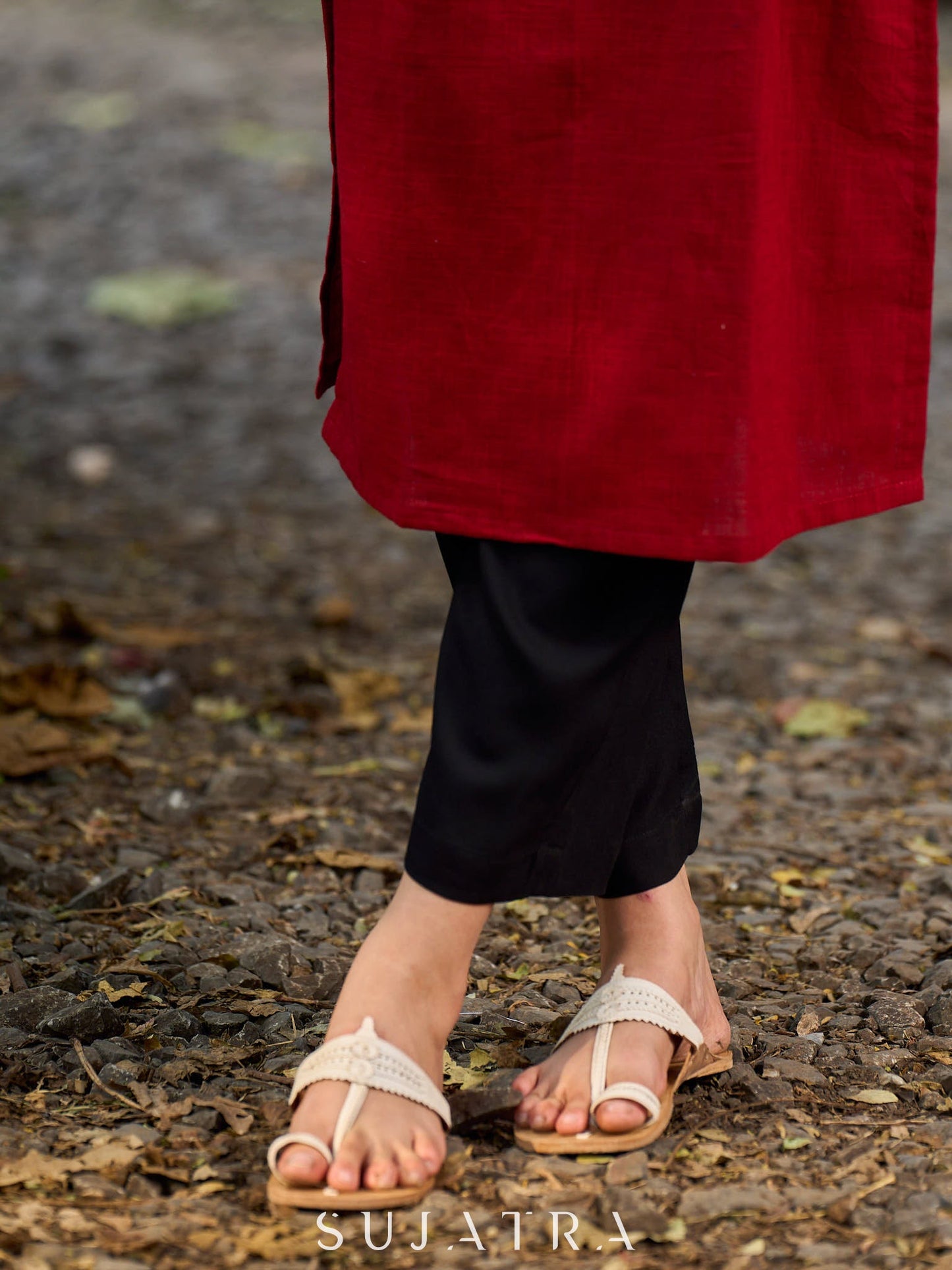 Elegant Ajrakh polka dot kurta with bold black maroon tones and an asymmetrical neck.