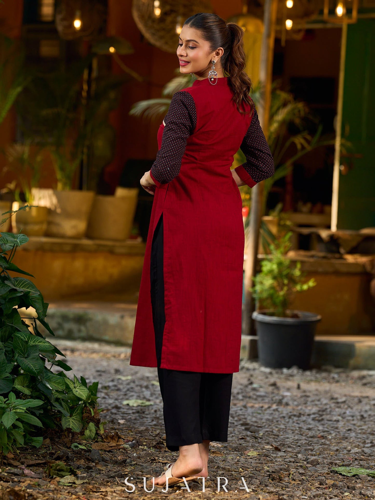Elegant Ajrakh polka dot kurta with bold black maroon tones and an asymmetrical neck.