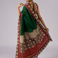 Stunning green cotton saree with beige and red floral Ajrakh accents