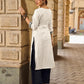 Timeless Off-White Cotton Kurta Featuring Hand Painted Warli Folk Art Yoke & Cuff Band
