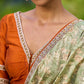 Enchanting Sage Green Saree with All-Over Foil Floral Print & Golden-Orange Trim Detail with Hand Embroidered Pallu