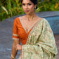 Enchanting Sage Green Saree with All-Over Foil Floral Print & Golden-Orange Trim Detail with Hand Embroidered Pallu