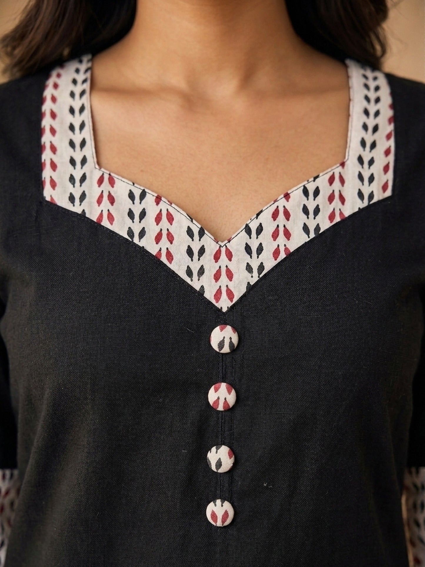 Timeless Black Cotton Kurta with Ajrakh Printed Sweetheart Neckline & Matching Sleeve Detail