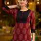 Stunning maroon Ajrakh kurta with an artisanal black pintuck patch.