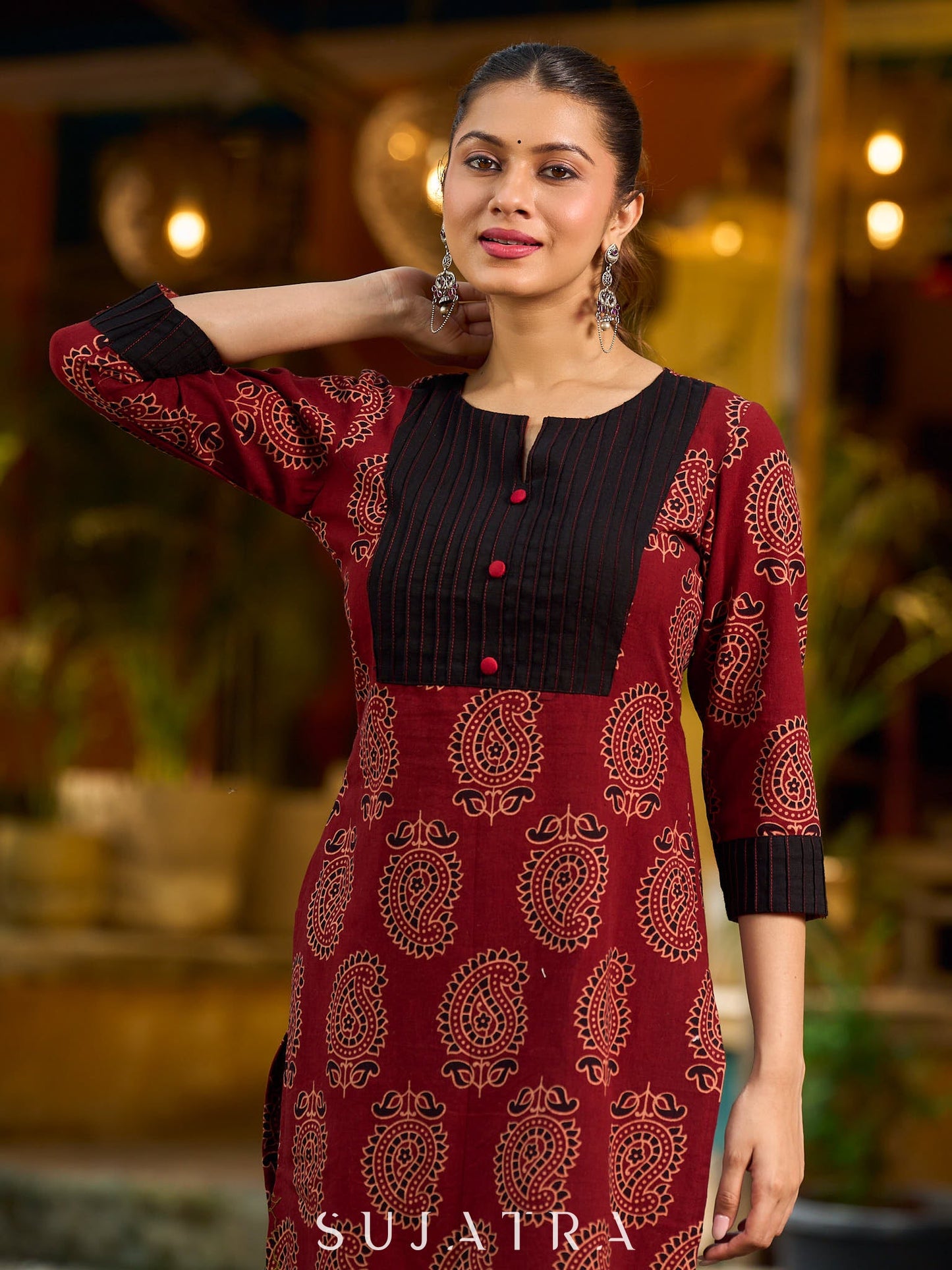 Stunning maroon Ajrakh kurta with an artisanal black pintuck patch.