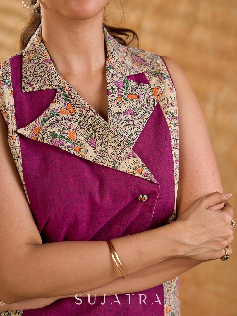 Elegant Madhubani jacket featuring magenta panels, asymmetrical closure, and a notch collar, enhanced with matching accents for a clean, tailored silhouette ideal for elevated corporate wear.
