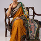 Vibrant yellow Bandhni print rayon saree with hand painted Madhubani art