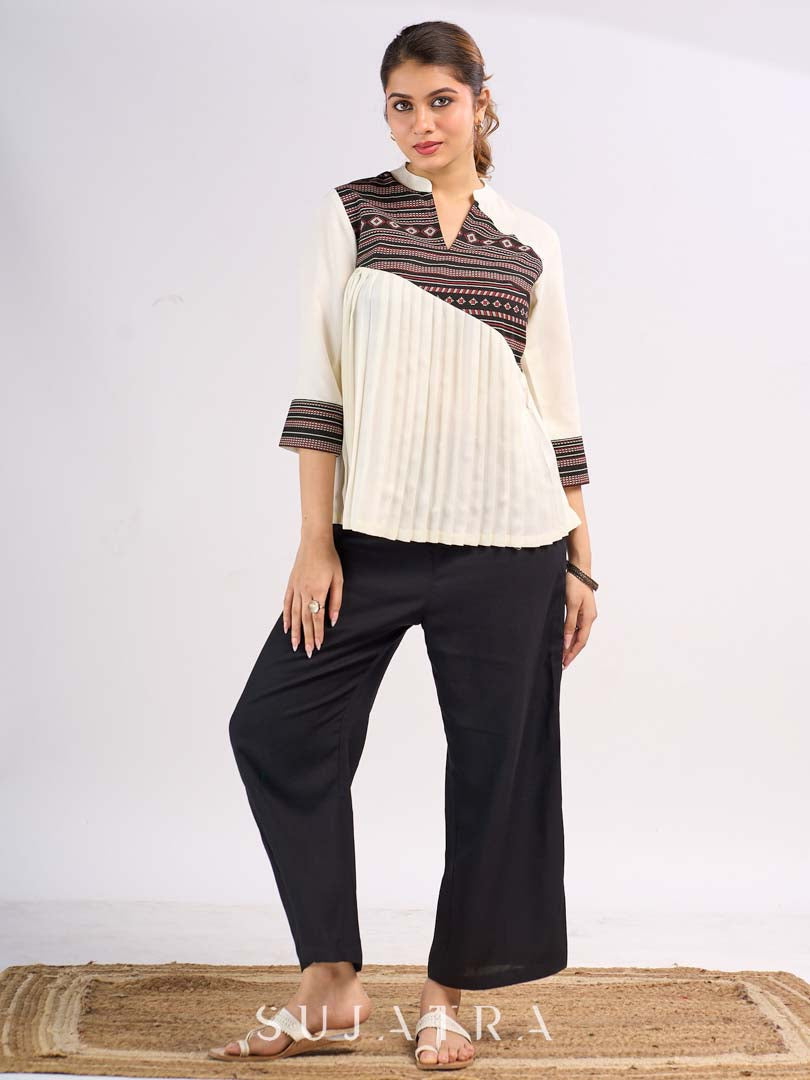 Cream Rayon Designer Top with Contrast Geometric Print Panel & Statement Pleats