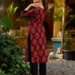 Stunning maroon Ajrakh kurta with an artisanal black pintuck patch.