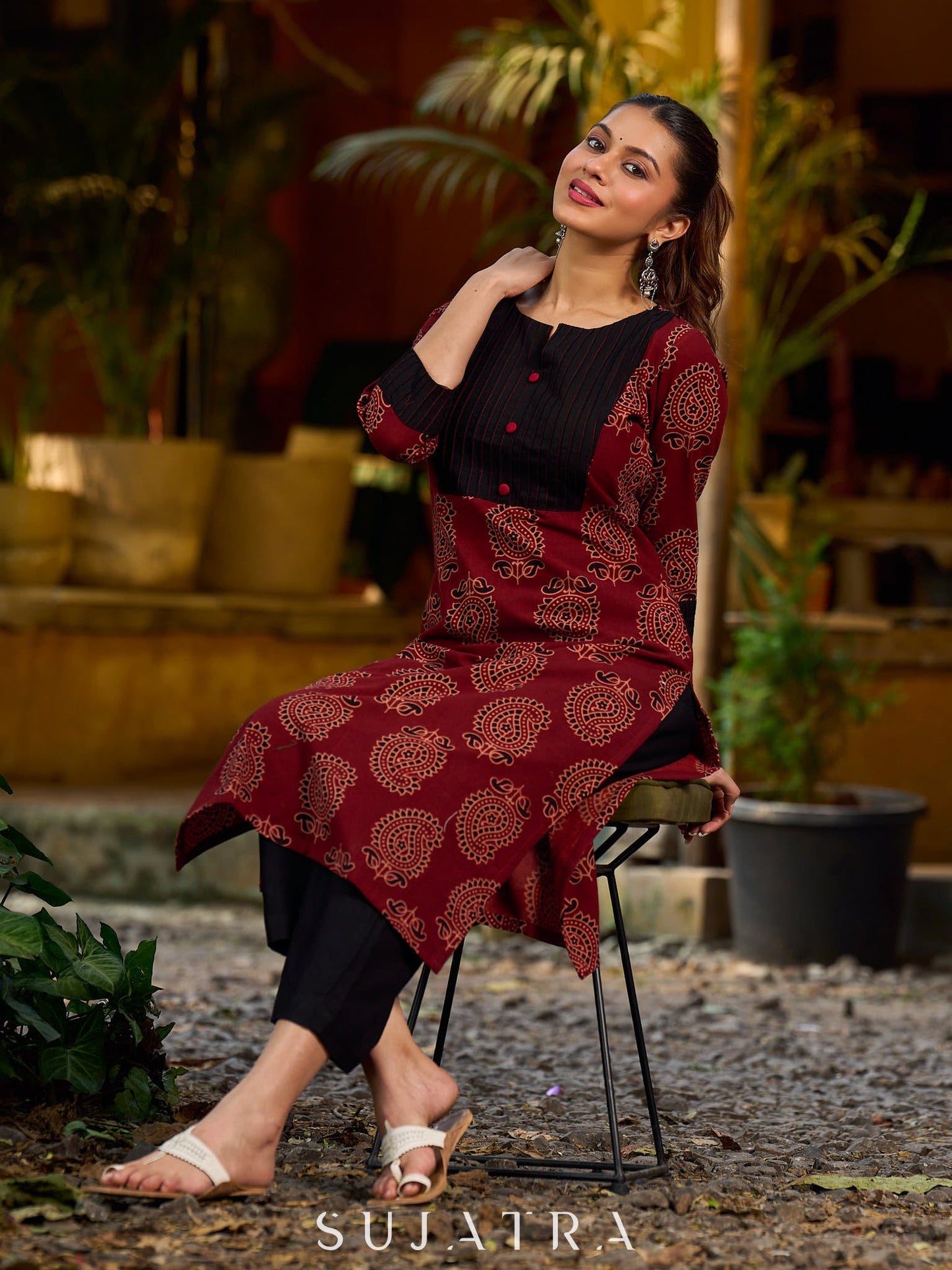 Stunning maroon Ajrakh kurta with an artisanal black pintuck patch.