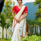 Traditional Ivory Chanderi Saree with Red-Gold Scalloped Border & Hand Embroidered Pallu
