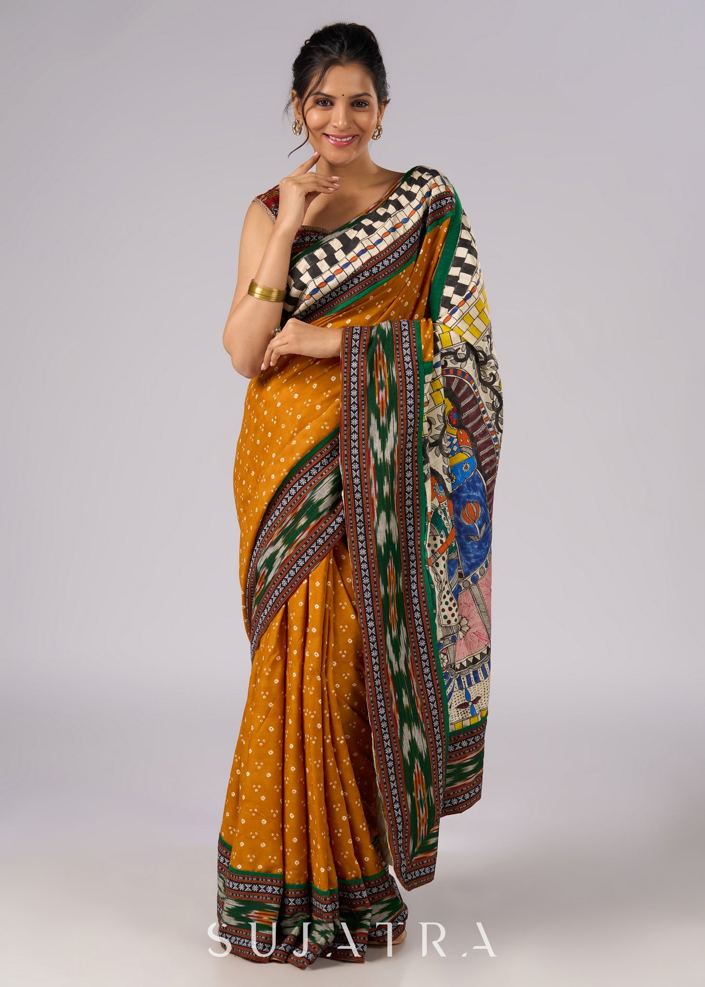 Vibrant yellow Bandhni print rayon saree with hand painted Madhubani art