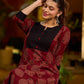 Stunning maroon Ajrakh kurta with an artisanal black pintuck patch.