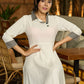 Monochrome Muse Off-White Flowy Dress with Checkered Accents