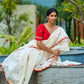 Traditional Ivory Chanderi Saree with Red-Gold Scalloped Border & Hand Embroidered Pallu
