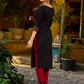 Elegant black kurta featuring an Ajrakh leaf patch across the neck panel