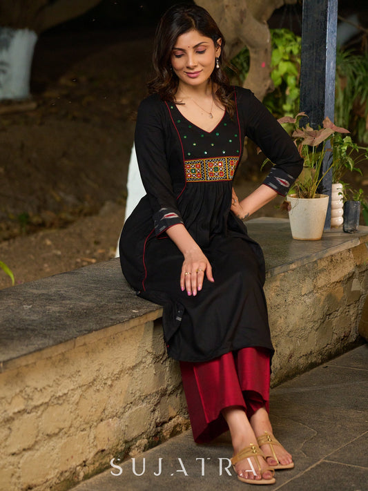 Black Cotton Panel Kurta with Ikat Accents in Sleeves and Flare, Embellished with Delicate Mirrors