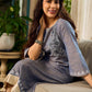 Two-tone handloom cotton dress with delicately painted Madhubani fish motifs and pleated hem.