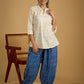 Classic off -white cotton top featuring delicate hakoba embroidery work.