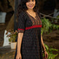 Black Ikat Weave Kurta Featuring Artisan Ajrakh Yoke