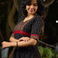 Black Ikat Weave Kurta Featuring Artisan Ajrakh Yoke
