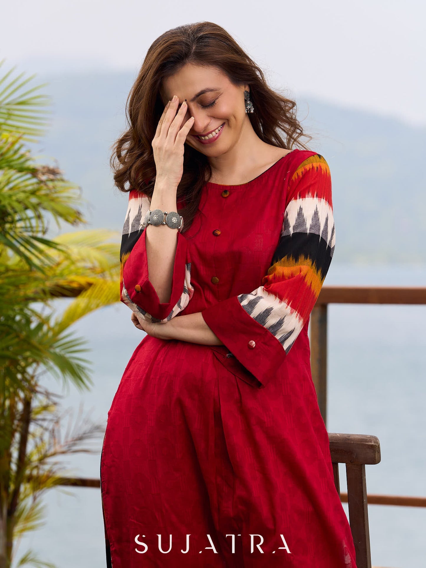 Elegant Red Cotton Jamdani Kurta with Complementing Ikat Patterned Sleeves and Front Pleat Details