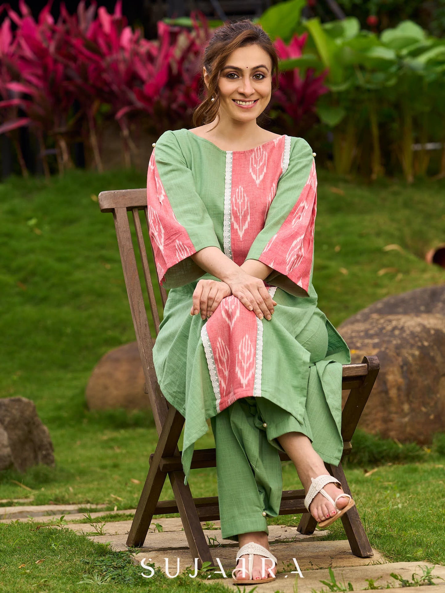 Subtle Pista Cotton Kurta featuring Asymmetric Peach Ikat Border Detailing