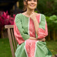 Subtle Pista Cotton Kurta featuring Asymmetric Peach Ikat Border Detailing