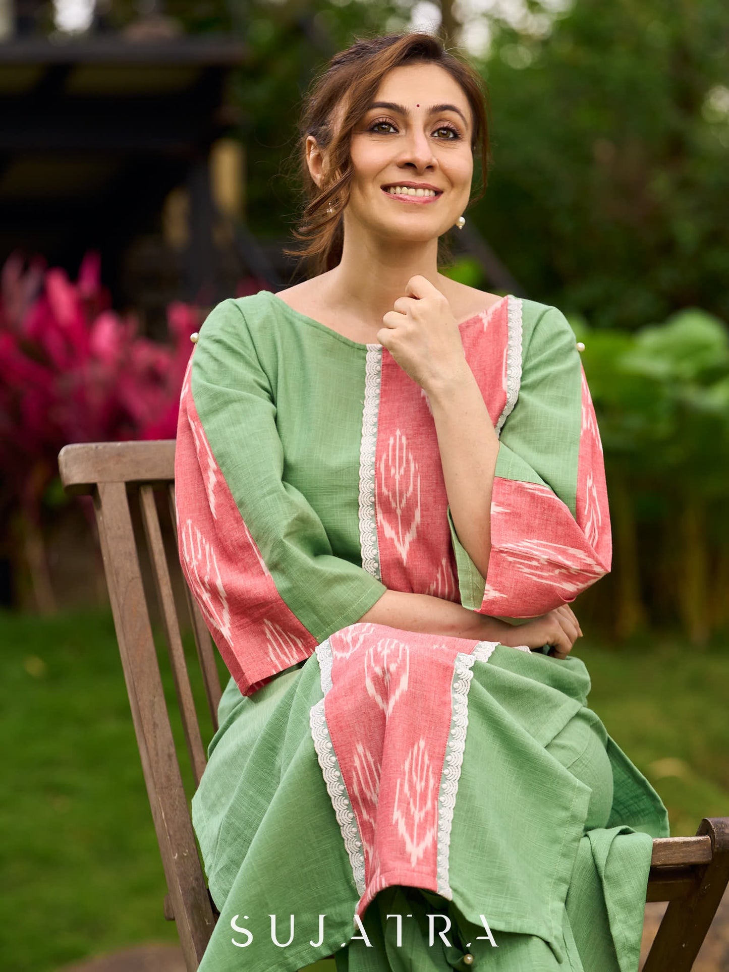 Subtle Pista Cotton Kurta featuring Asymmetric Peach Ikat Border Detailing