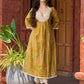 Exquisite yellow Bandhani printed kurta with a delicate off-white tissue overlay and refined accents.