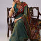 Elegant tissue saree with hand painted Kalamkari pallu