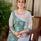 Breezy White Cotton Kurta with Green Floral Hand Block Print Asymmetric Panel and Cold Shoulder Accent