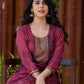 Exquisite deep burgundy printed kurta with intricate neck panel embroidery, delicate green beads, and refined green highlights.