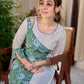 Breezy White Cotton Kurta with Green Floral Hand Block Print Asymmetric Panel and Cold Shoulder Accent