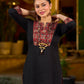 elegant black cotton kurta with beautifully crafted ajrakh panel and subtle stripe piping accents