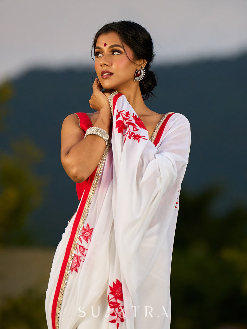 Artisanal White Georgette Saree with Red Embroidered Motifs & Beaded Border Trim