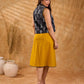 Tailored black Kantha jacket featuring fish motifs, a mustard pintuck patch, and a flipped collar, offering a structured silhouette with refined detail and distinctive, contemporary character.