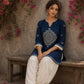 Captivating navy top adorned with a bold, rhythmic block print design, pleated sleeve detailing, and a versatile cut.
