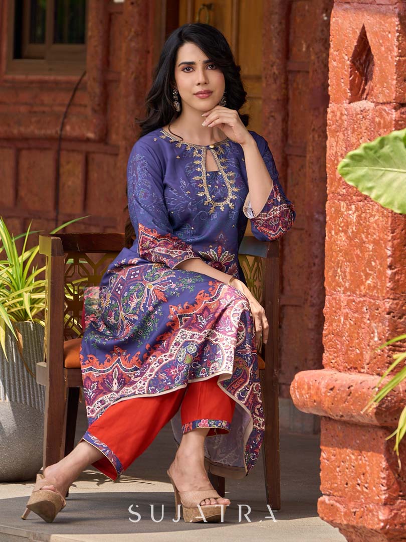 Stunning royal blue printed kurta adorned with handcrafted zardozi and sequin detailing on the keyhole neck.