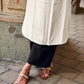 Elegant Off-White Rayon Sleeveless Kurta with Contrast Black Floral Embroidered Yoke Panel