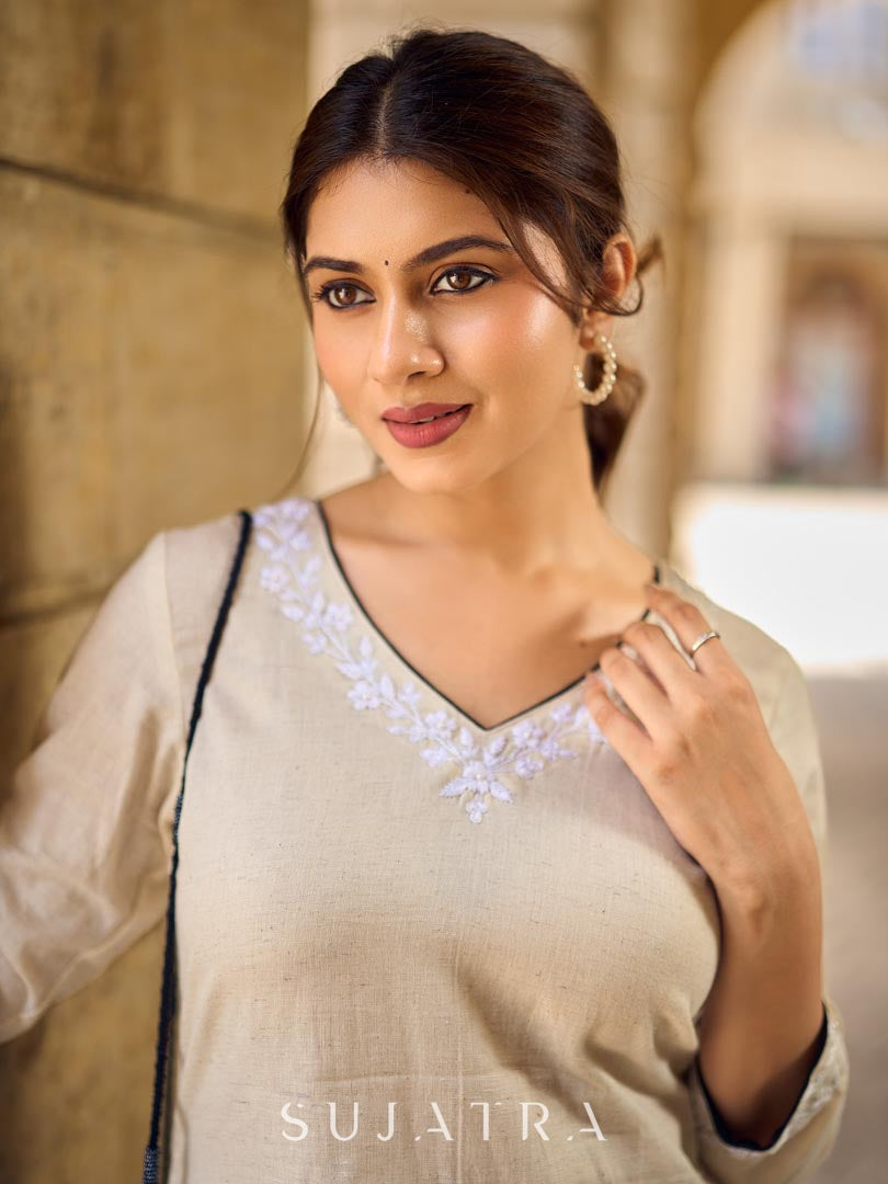 Pristine Off-White Cotton Flex Straight Kurta Featuring Subtle Monochrome Embroidery on Neckline & Sleeve Cuffs