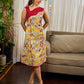Elegant cream and maroon Madhubani dress featuring sophisticated wavy pintuck flap detailing.