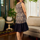Stunning black Kalamkari overlap dress featuring a chic asymmetrical gathered hem.